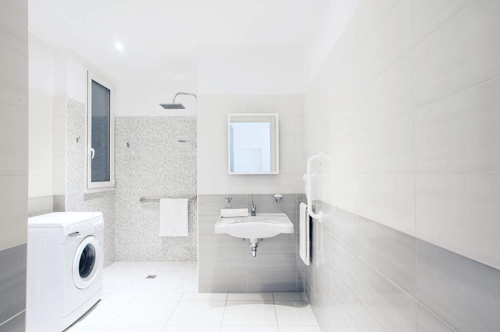 Vuelle Residence Apartments Capo dʼOrlando Quarto foto