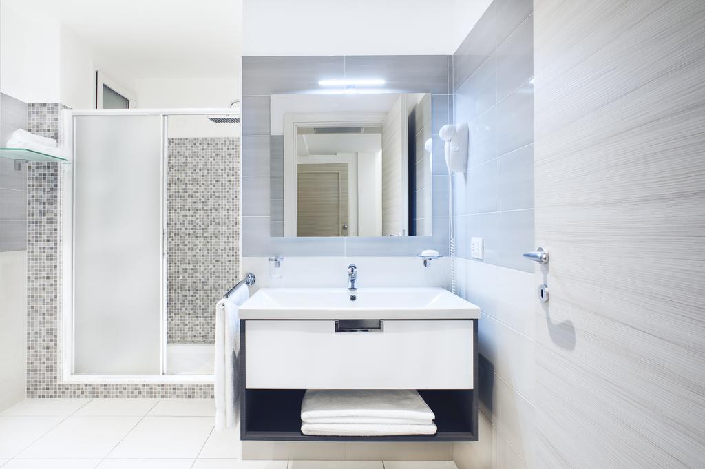 Vuelle Residence Apartments Capo dʼOrlando Quarto foto