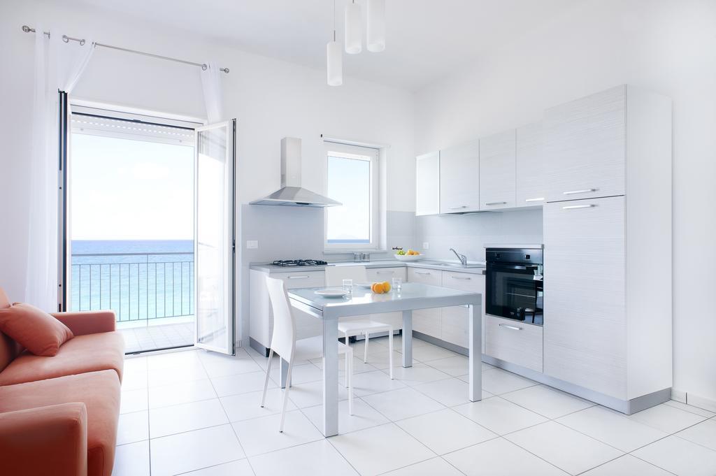 Vuelle Residence Apartments Capo dʼOrlando Quarto foto