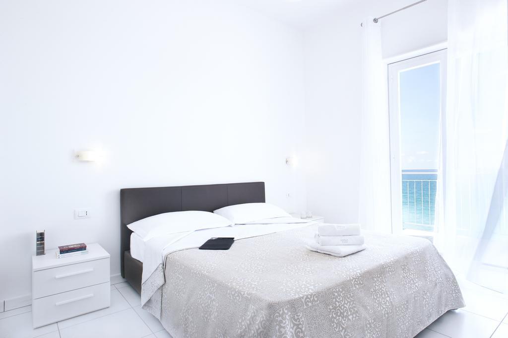 Vuelle Residence Apartments Capo dʼOrlando Quarto foto