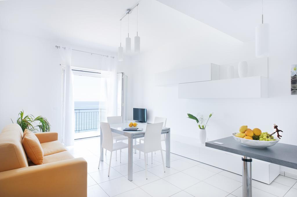 Vuelle Residence Apartments Capo dʼOrlando Quarto foto